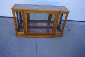 lot 127 image: Glass beveled edged TV stand 48 x 14 D x 29 T