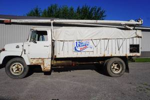 lot 96 image: Ford 7000 Feed bulk delivery truck with auger and hoist, currently not running