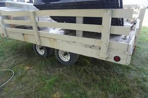 lot 101 image: Double axle Snowmobile trailer with wood slate sides