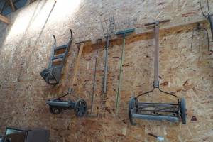 lot 135 image: 2 Wheel cart, reel mower, rakes, another reel mower