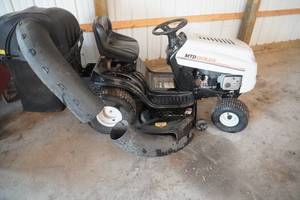 lot 76 image: MTD Gold Tractor Mower with bagger-new motor, needs carb and battery