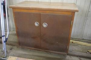 lot 194 image: Two door wood cabinet