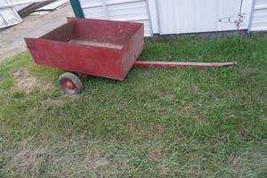 lot 197 image: Two wheel red yard cart