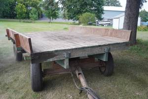 lot 87 image: Wood top rock wagon with hoist