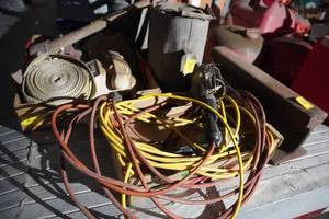 lot 214 image: Trouble light, cords, water pitchers, RR iron, pick