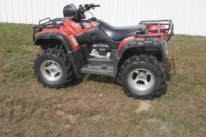 lot 208 image: Honda 500 Foreman Rubicon four wheeler