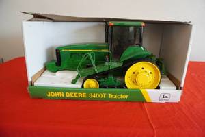 lot 62 image: John Deere 8400T Tractor in box