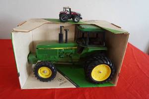 lot 79 image: John Deere 4850 MFWD Row Crop & small case