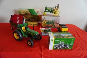 lot 97 image: John Deere tractors, brake parts, collectibles