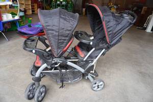 lot 296 image: Baby Trend Double Stroller, Sit and Stand