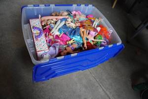 lot 311 image: Large tub full of Barbies dolls and accessories