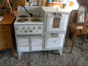 lot 57 image: Monarch Universal Elec cast stoveoven