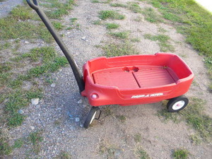 lot 81 image: Red Radio Flyer plastic wagon-back and cup holders