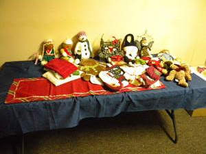 lot 133 image: Christmas stockings,dolls,linens,dcor