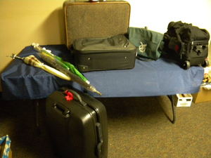 lot 162 image: Suitcases, umbrellas, bowling ball
