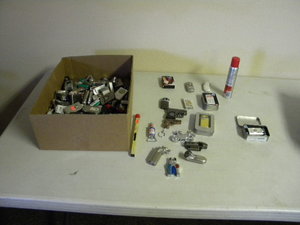 lot 177 image: 100s of cigarette lighters