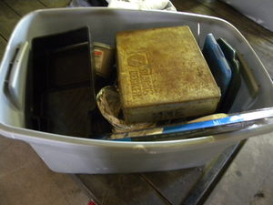 lot 201 image: Grey tub, wrenches, caulking gun
