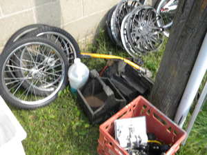 lot 217 image: 3) Bike tires, hub caps, door locks