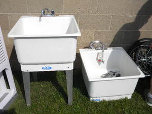 lot 218 image: 2) Ultla laundry tubs & faucets