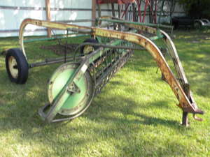 lot 233 image: John Deere 896 A four bar rake
