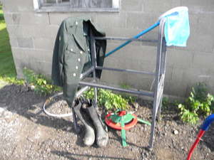 lot 247 image: Roller rack, Green Army coat etc.