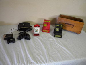 lot 560 image: 2) Tin cash registars, 2) binoculars