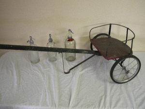 lot 578 image: Pull carts & 3 dispenser bottles