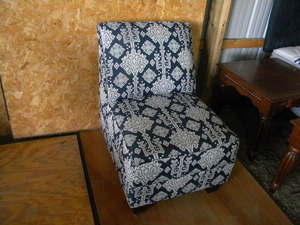 lot 591 image: Stuffed armless large chair
