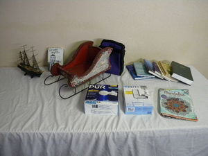 lot 622 image: Wooden sleigh, books, ship, etc