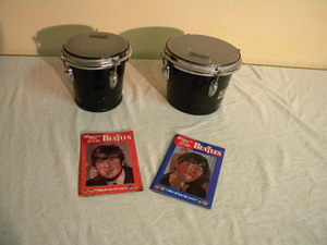 lot 651 image: 2) Bongo drums & 2) Beatles books