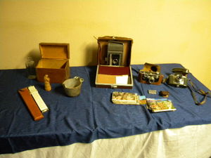 lot 704 image: 3) Camers, Slide rule, postcards