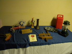lot 710 image: Wood clamp, Coleman lantern
