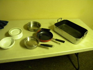 lot 722 image: Corelle dishes, 3 fry pans & roaster