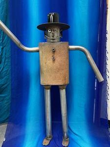 lot 28 image: Custom Art from Wundrow Auto Muffler Man