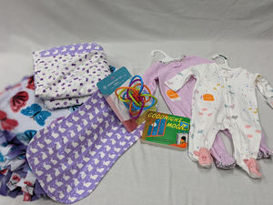 lot 68 image: Baby Girl homemade Blanket, Baby Clothes and book.
