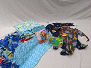 lot 69 image: baby boy Homemade Blanket, Clothes, and baby book