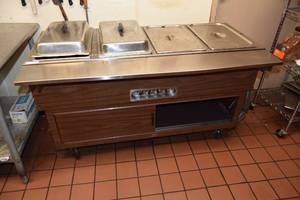 lot 20 image: Four Well Buffet Table
