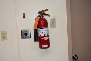 lot 21 image: Red Fire Extingusher