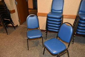 lot 85 image: 8 stackable blue padded chairs