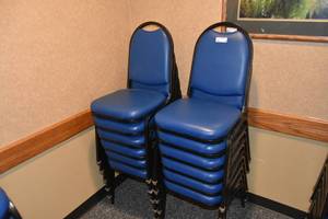 lot 94 image: 12 stackable blue padded chairs