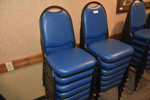 lot 102 image: 12 stackable blue chairs