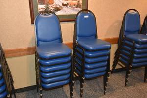 lot 103 image: 12 stackable blue chairs