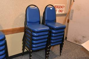 lot 104 image: 12 stackable blue chairs
