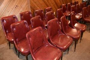 lot 114 image: 12 Red padded chairs