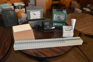 lot 152 image: 3 time clocks and cards