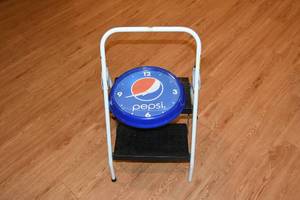 lot 314 image: Pepsi battery clock and step stool