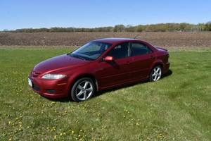 lot 3 image: 07 Red Mazda 6 wManuel Trans
