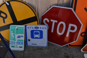 lot 22 image: Stop Sign and 2) Metro bus signs