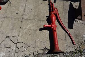 lot 30 image: Red Windmill hand water pump
