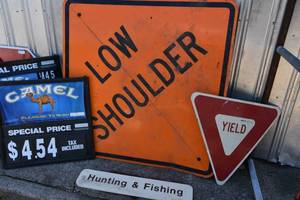 lot 36 image: Yeild sign, 2) Camel paper signs